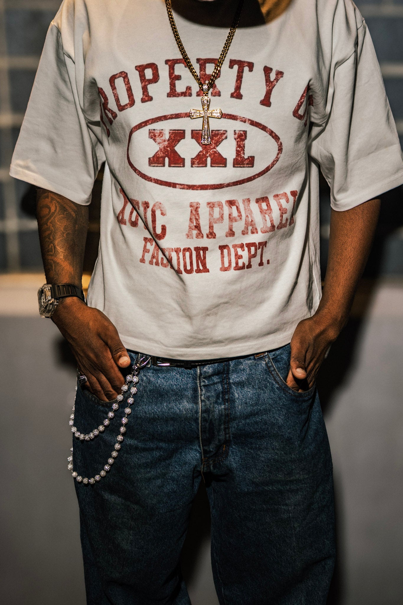 Red "Property of Xotic Apparel" tee