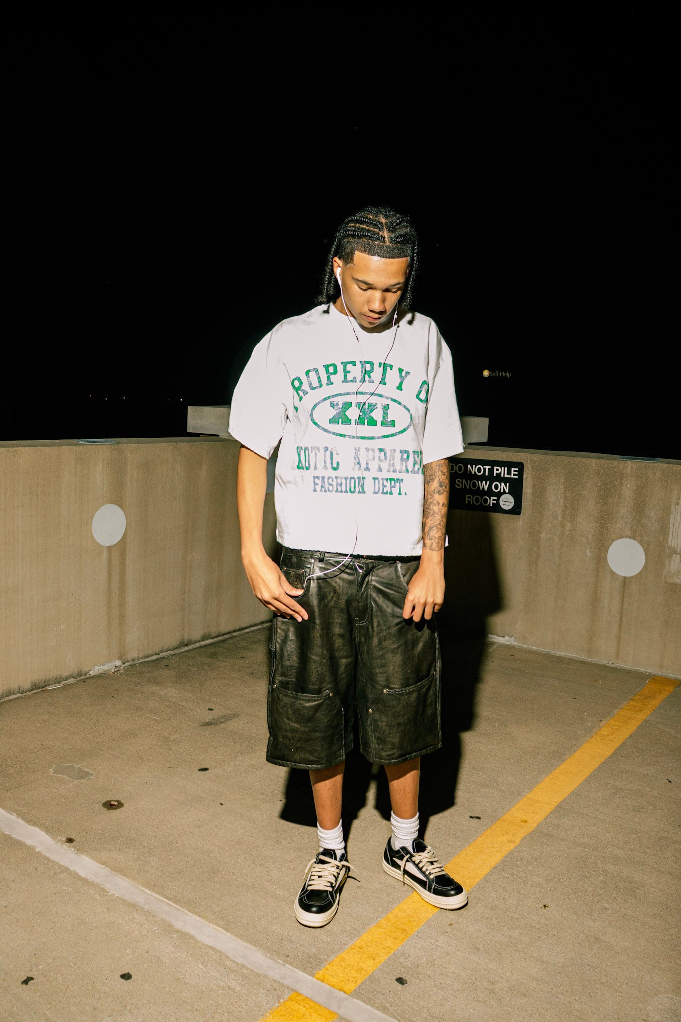 Green "Property of Xotic Apparel" tee